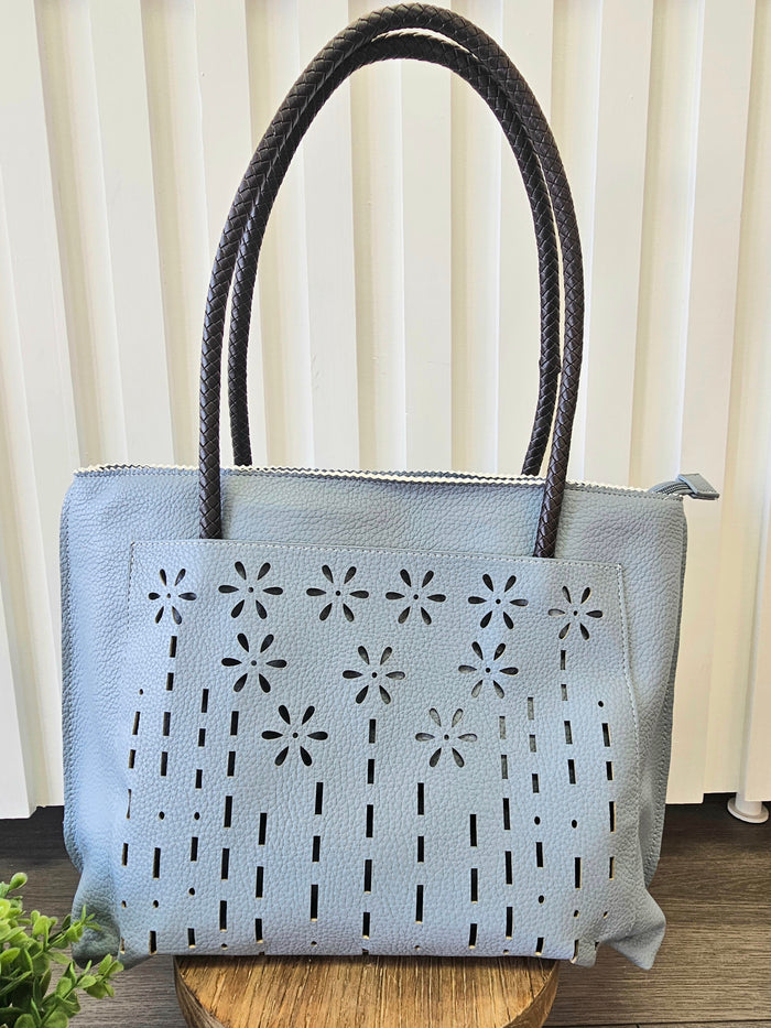 Tote bag with floral detail.