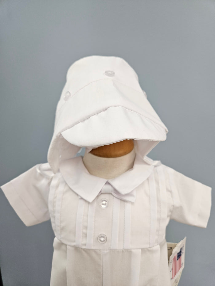 Baby boy onesie with bow tie and bonnet.