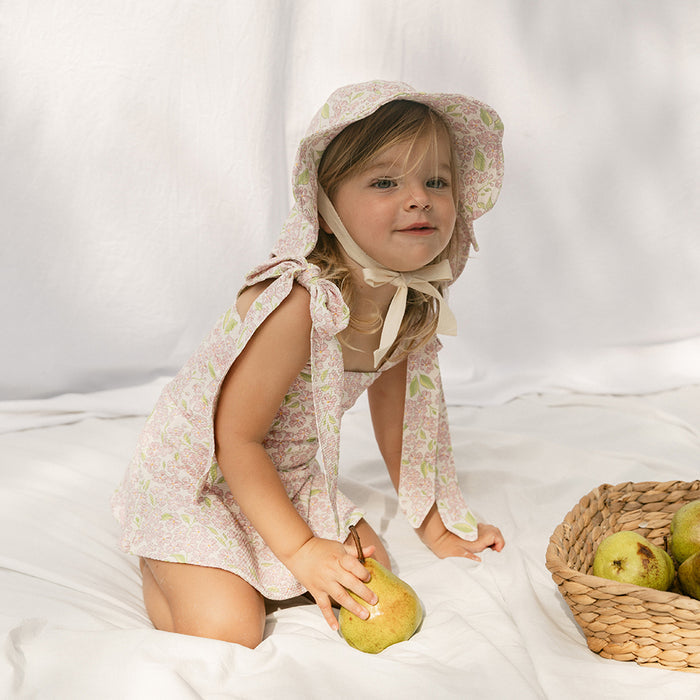 Petit Playa Lola Swim Dress in Peony print, sun-safe UPF50+ swimwear for babies and girls