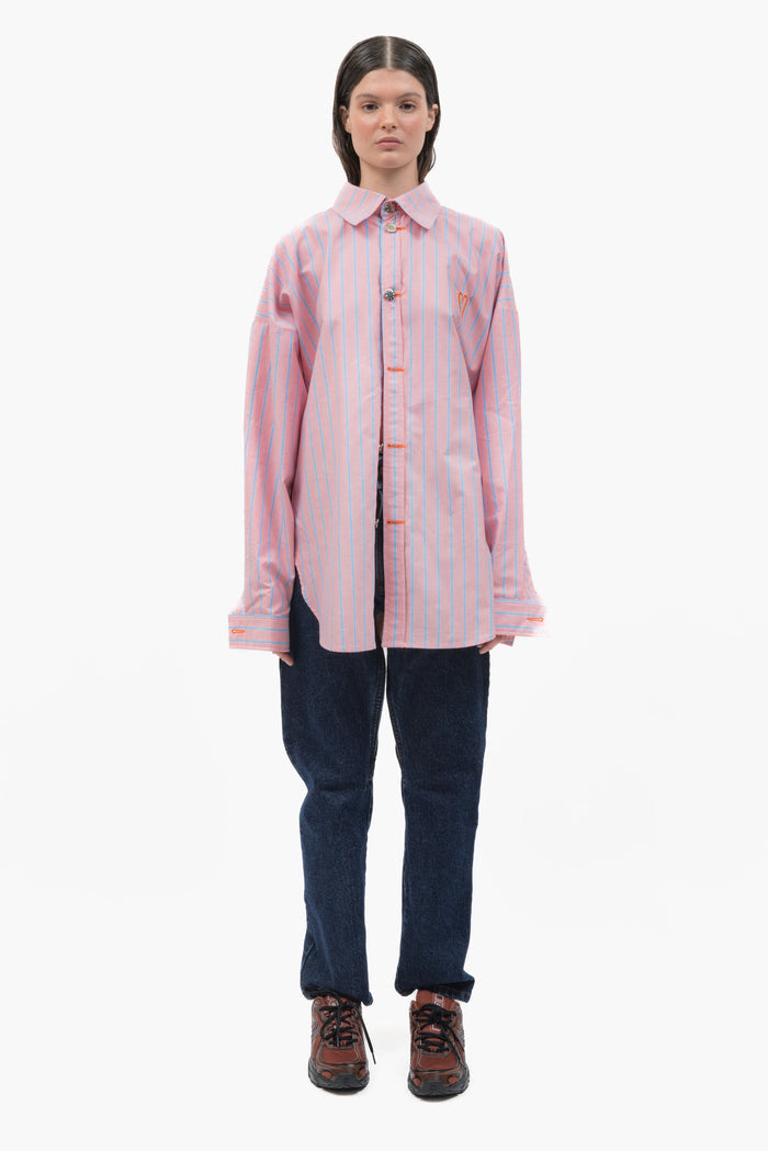 MANCANDY Monday Shirt in pink striped cotton featuring an oversized fit and orange Bladed Heart embroidery on the chest.