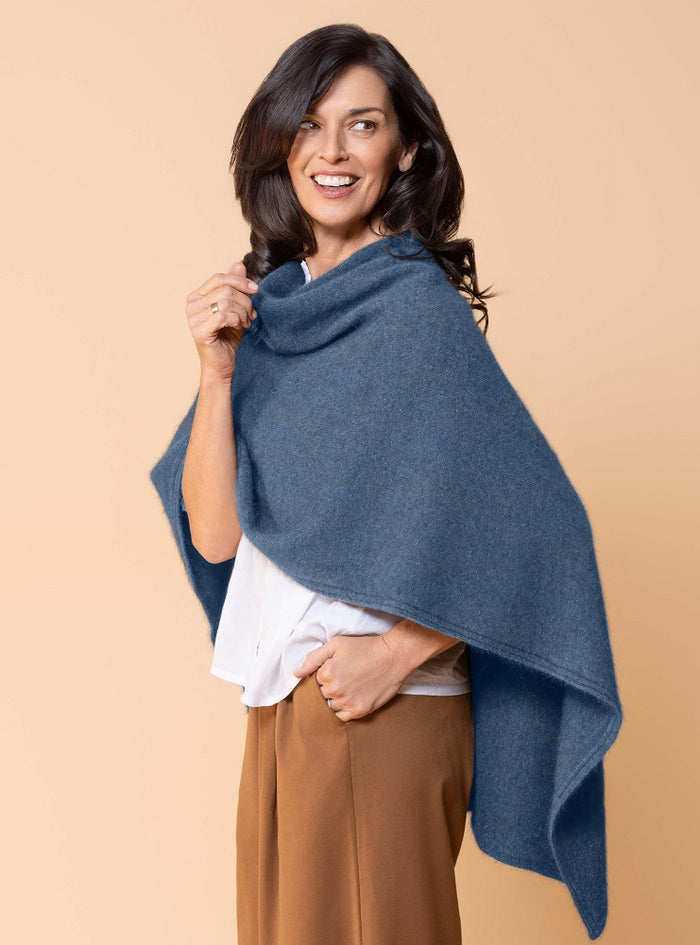 Possum and Merino.  NW3086 North Cape - Versatile cape designed to provide ultimate comfort and maximum freedom.  Single jersey construction, this garment can be worn numerous ways from a cape to knee rug and even a scarf.  Composition - 40% Possum Fur, 53% Merino, 7% Silk.  One Size.