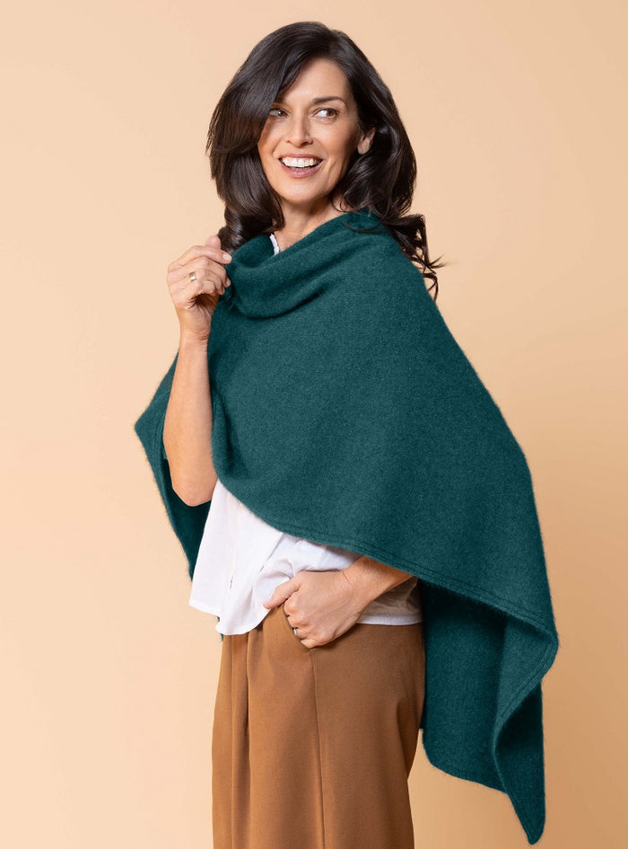 Possum and Merino.  NW3086 North Cape - Versatile cape designed to provide ultimate comfort and maximum freedom.  Single jersey construction, this garment can be worn numerous ways from a cape to knee rug and even a scarf.  Composition - 40% Possum Fur, 53% Merino, 7% Silk.  One Size.