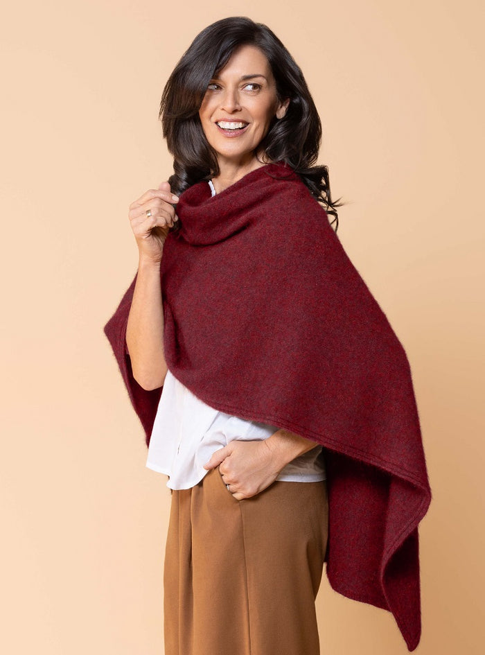Possum and Merino.  NW3086 North Cape - Versatile cape designed to provide ultimate comfort and maximum freedom.  Single jersey construction, this garment can be worn numerous ways from a cape to knee rug and even a scarf.  Composition - 40% Possum Fur, 53% Merino, 7% Silk.  One Size.