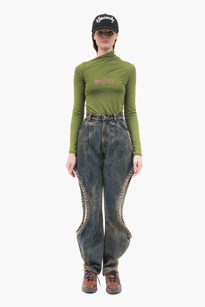 MANCANDY One Bite Jeans Dusty Blue in 100% cotton denim featuring a signature side cut-out, sculpted front pleat detail and embroidered back pocket logo.