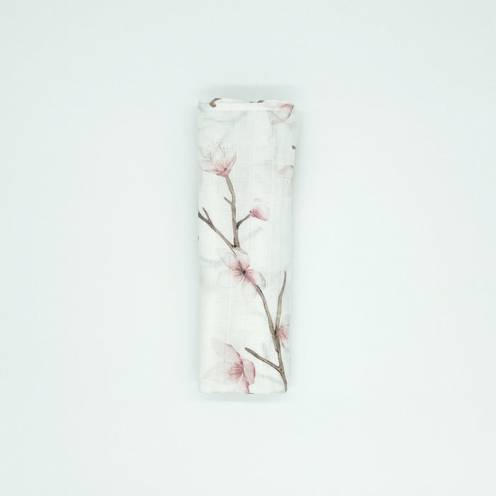 Lightweight organic cotton swaddle with floral design