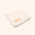 Petit Playa Organic Cotton Fleur Swaddle in Gardenia print, breathable organic cotton swaddle for babies and girls