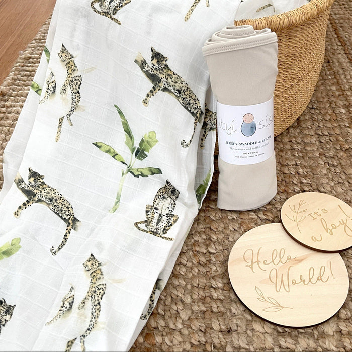 Lightweight organic cotton swaddle with jungle animal print