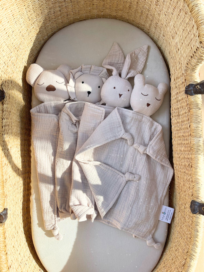 Four organic cotton baby comfort toys lightweight and breathable.