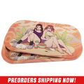 Rectangular tray with orange swirls featuring two women lounging with snacks and green leaf shapes behind them.