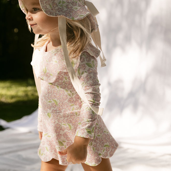 Petit Playa Petal Long Sleeve Swim Dress in Peony print, sun-safe UPF50+ swimwear for babies and girls — image 3