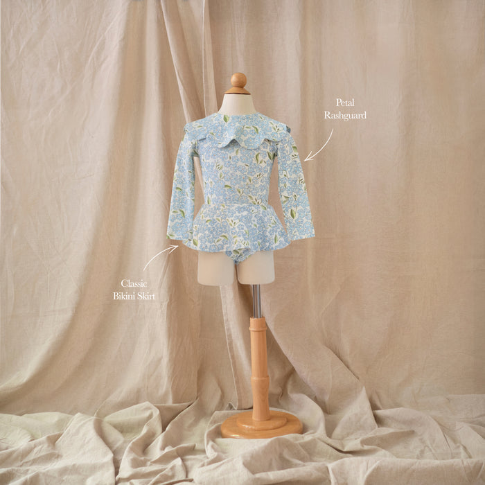 Petit Playa Petal Rashguard in Hydrangea print, sun-safe UPF50+ swimwear for babies and girls — image 3