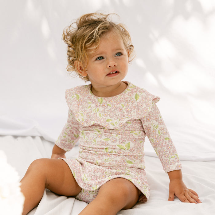 Petit Playa Petal Rashguard in Peony print, sun-safe UPF50+ swimwear for babies and girls
