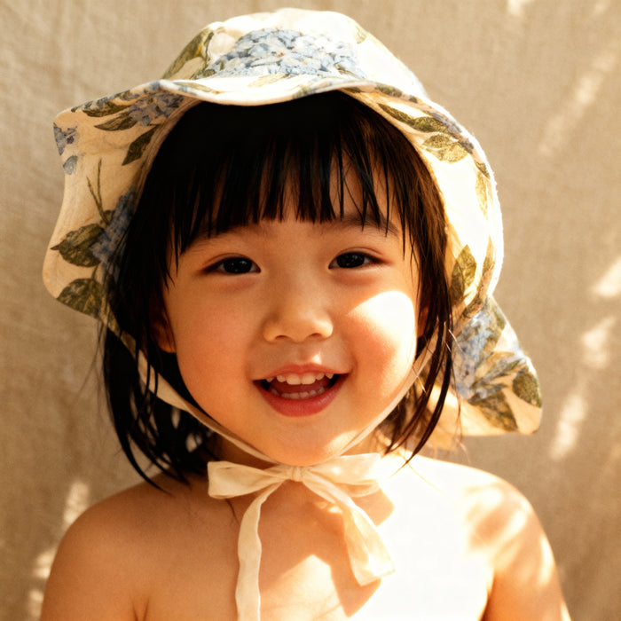 Petit Playa Petal Sun Hat in Bloom print, sun-safe UPF50+ sun hat for babies and girls