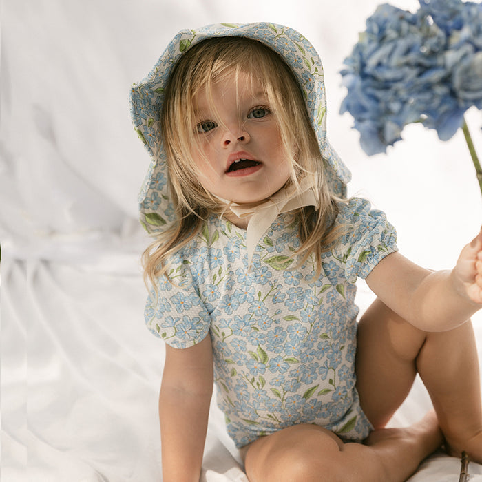 Petit Playa Valentina Swimsuit in Hydrangea print, sun-safe UPF50+ swimwear for babies and girls