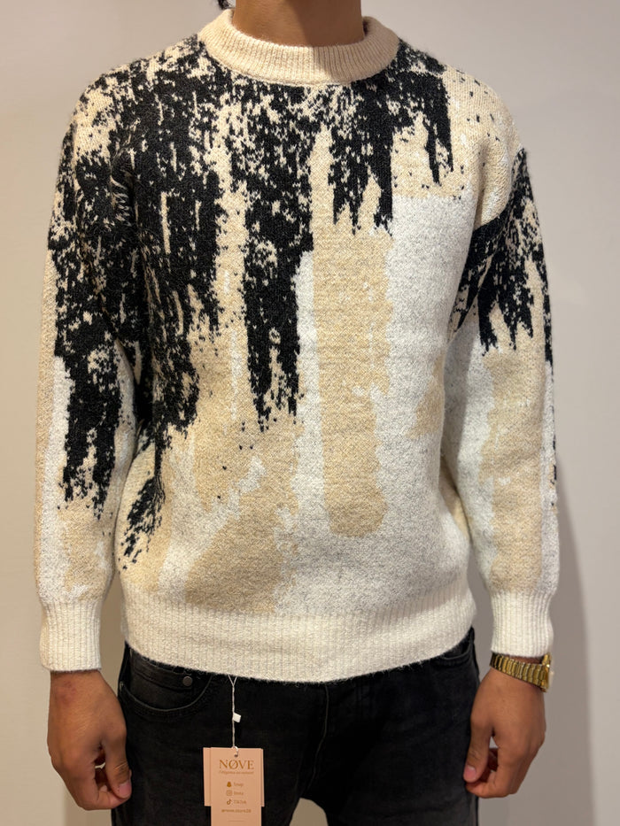Pull au design abstrait noir et blanc