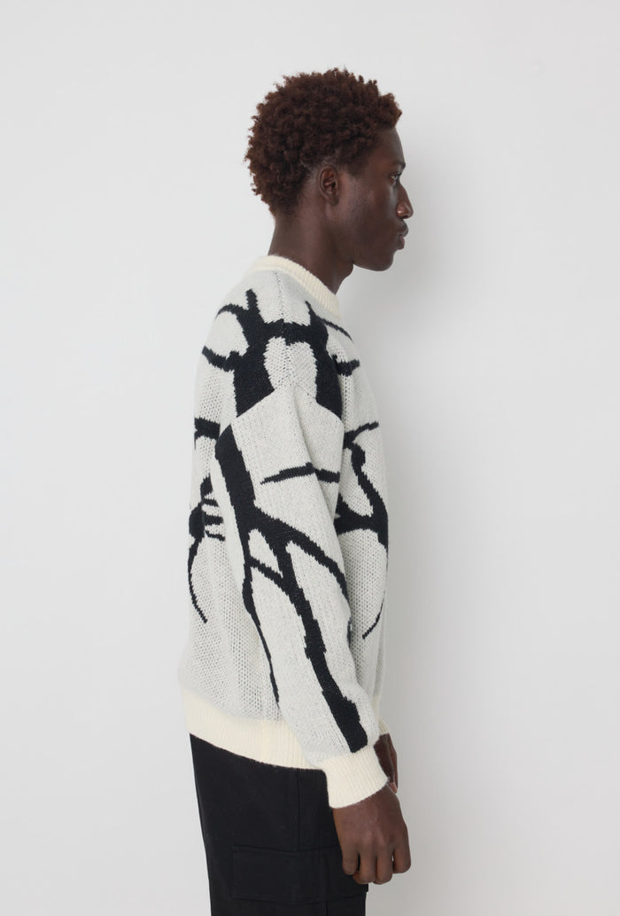 Pull Frilivin blanc cassé design abstrait noir
