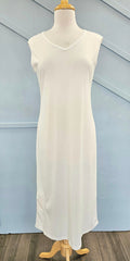 Raglan sleeve full length slip with pocket at hem.