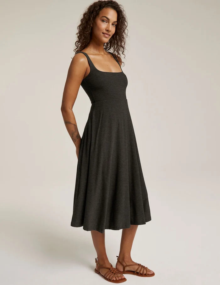 Woman wearing Beyond Yoga Ready Square Neck Dress with white background
