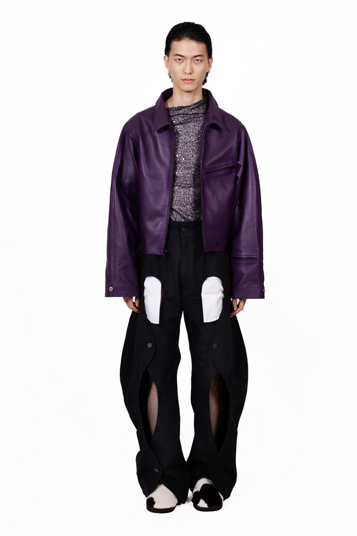 MANCANDY Rodeo Pants in cotton gabardine featuring buttoned front openings, contrasting patch pockets and a wide-leg silhouette.