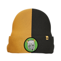 Two-tone black and mustard yellow beanie with a folded cuff featuring a green patch of a girl with cat ears and headphones.