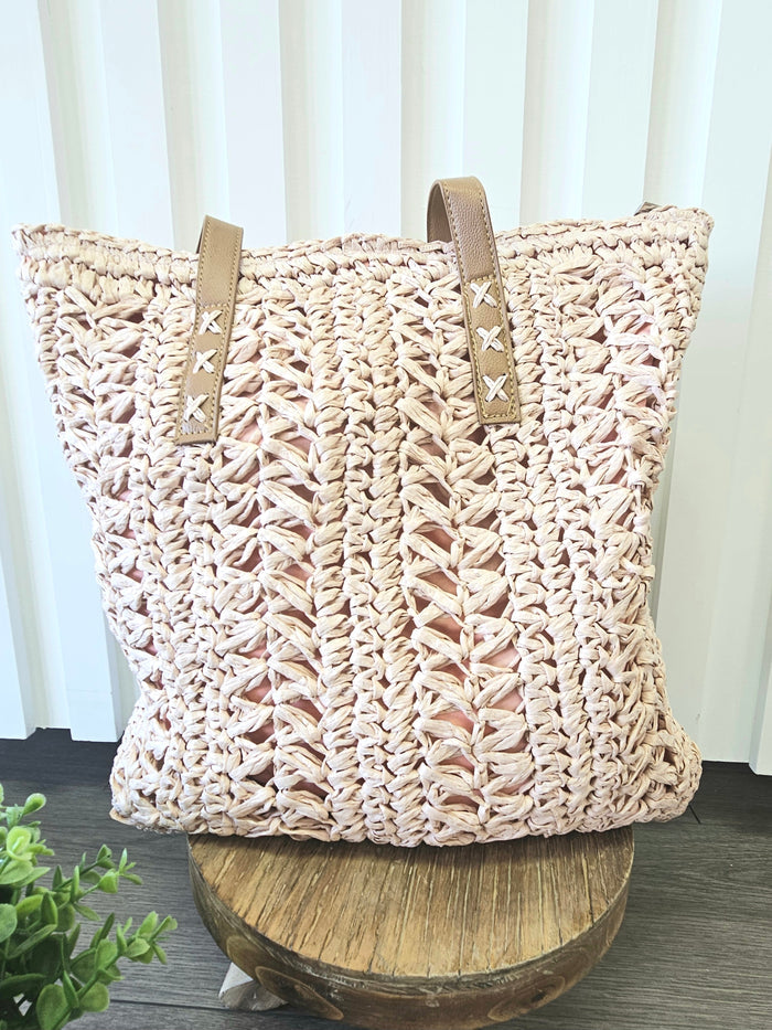 Woven straw tote bag.