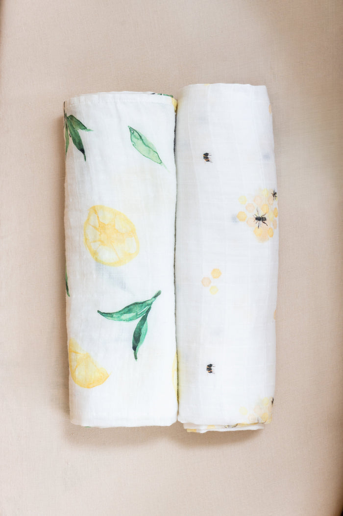 Organic muslin swaddle set in soft sunny tones