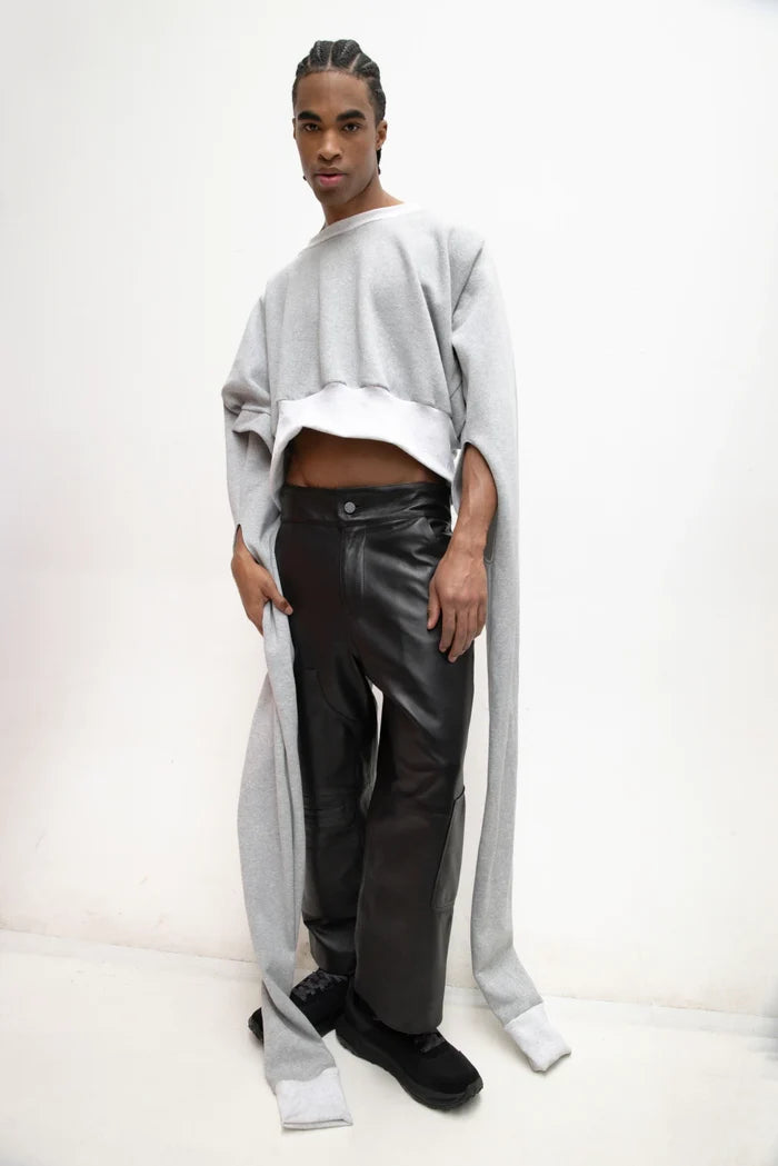 MANCANDY Trans Wrap Sweatshirt with extended wrap-around sleeves and transformable oversized silhouette.
