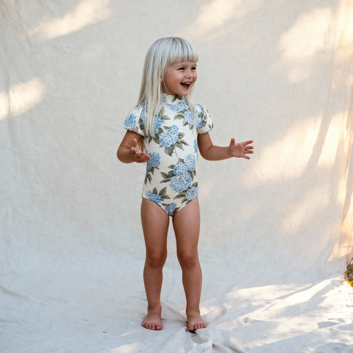 Petit Playa Valentina Swimsuit in Bloom print, sun-safe UPF50+ swimwear for babies and girls