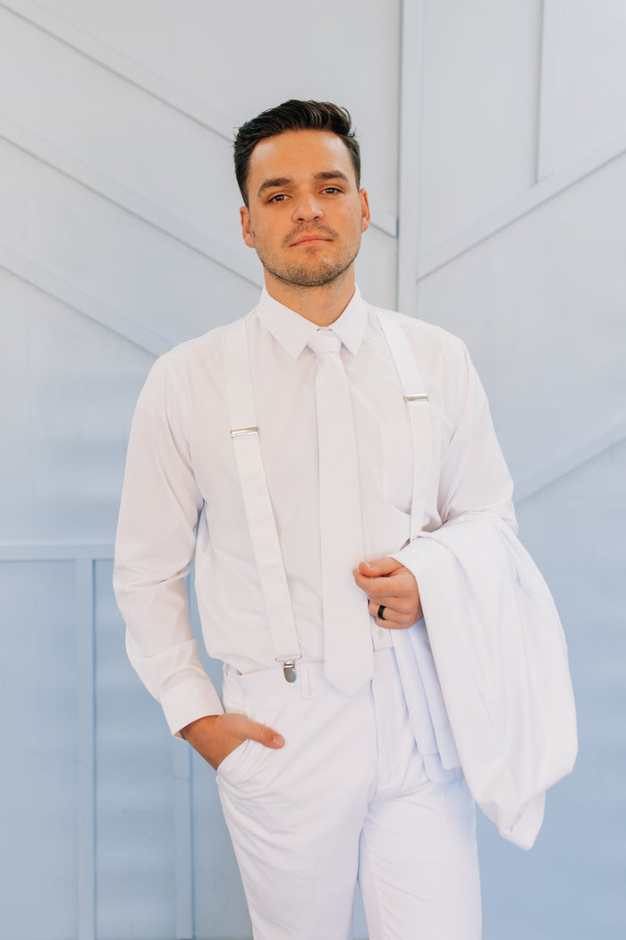 White suspenders on man.