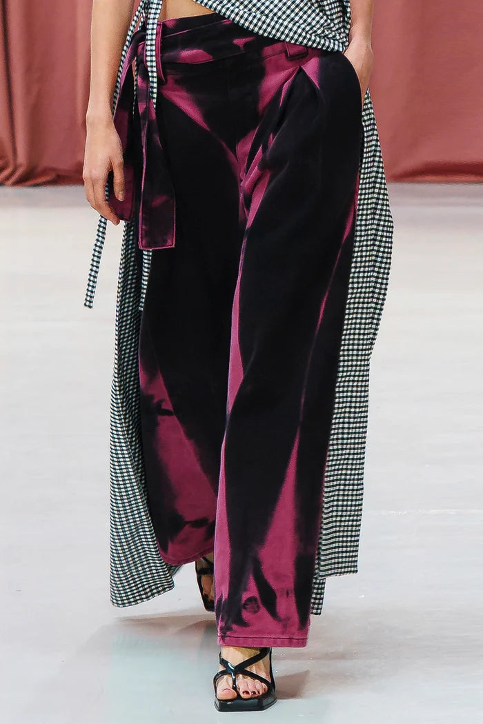 MANCANDY Goth Wide Jeans in black denim featuring a custom fuchsia artisan wash, integrated belt and oversized wide-leg silhouette.
